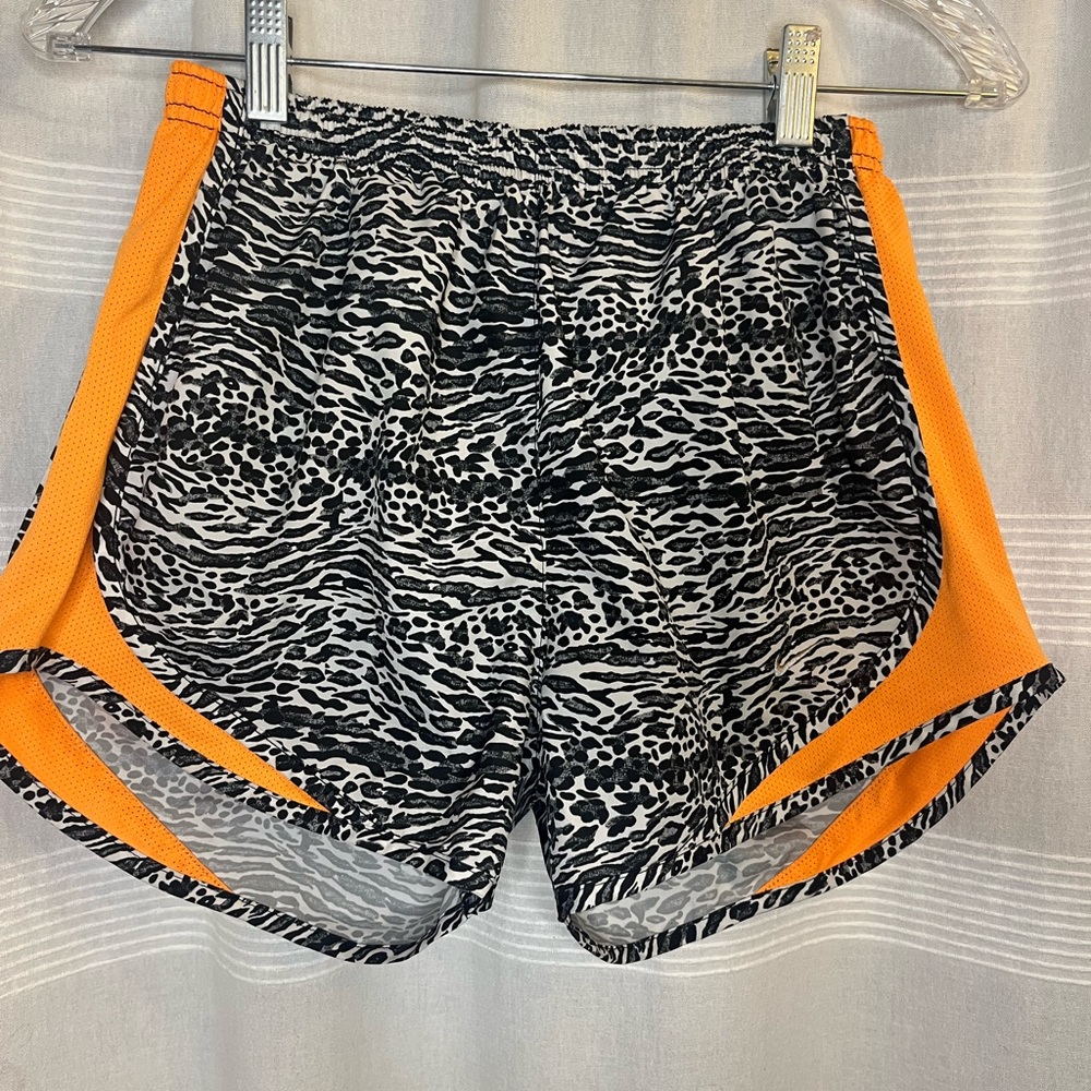 Woman’s Nike dri-fit running shorts orange black white zebra size small workout